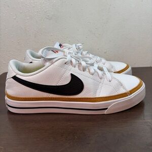 Nike Court Legacy White Sneakers with Black Swoosh and Gold Trim